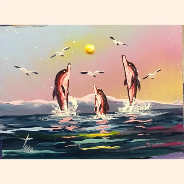Delfines del Atardecer